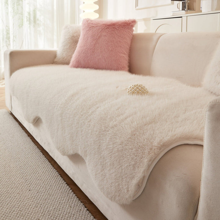 Ultra-soft cream Scandinavian sofa cover. Fluffy couch protector for modern living room decor.