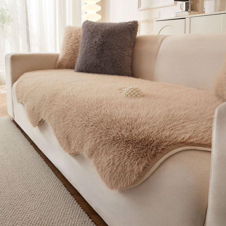 Khaki soft Scandinavian sofa cover. Pet-friendly couch protector, modern living room decor blanket.