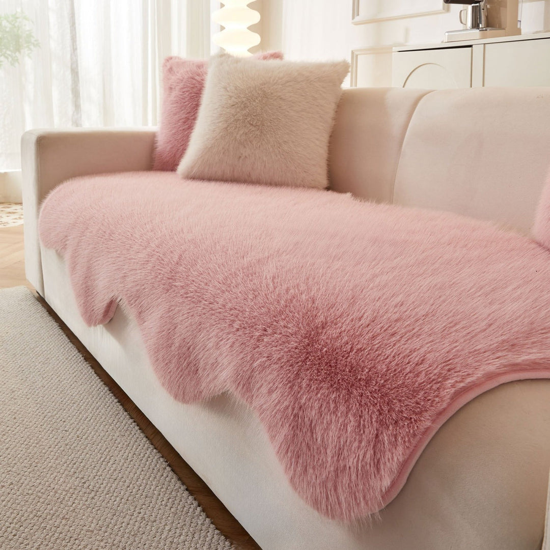 Ultra-soft living room sofa cover in cream. Scandinavian style fluffy blanket, ideal couch protector.