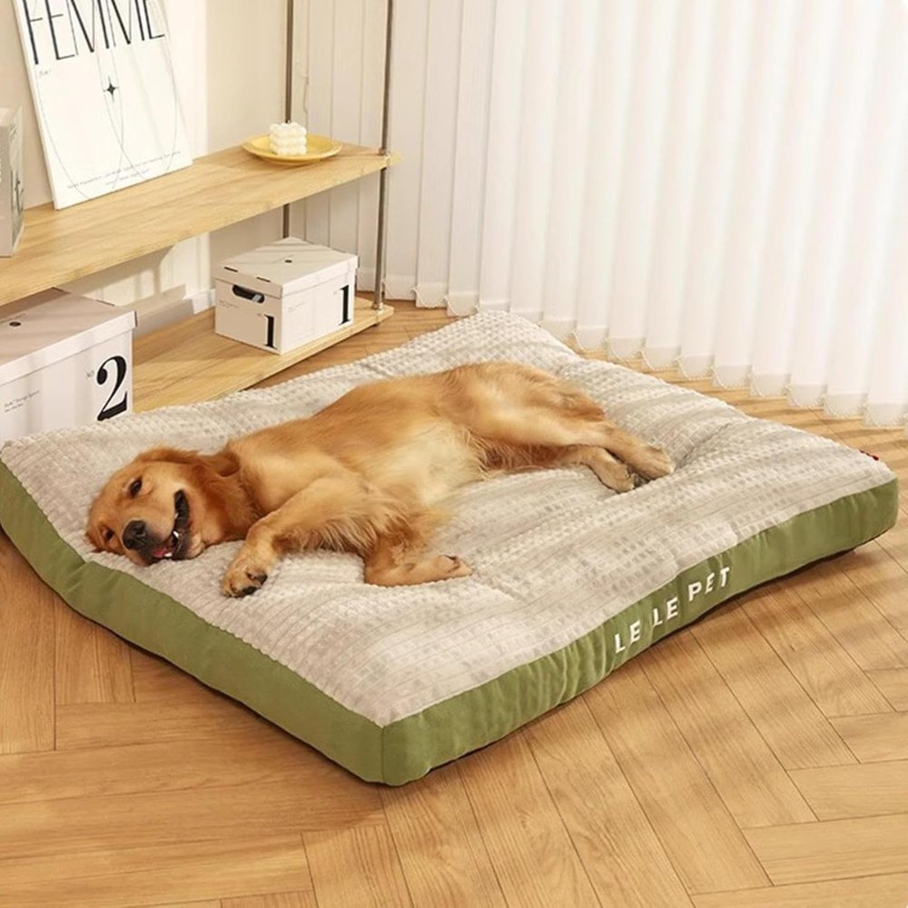 Large ultra-soft fleece dog bed, durable and cozy, ensuring comfortable pet sleep.