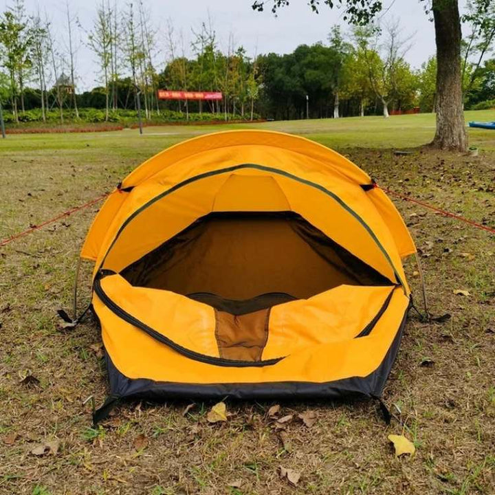 Army green ultralight solo tent, waterproof and windproof, ready for challenging backpacking & hiking trips.