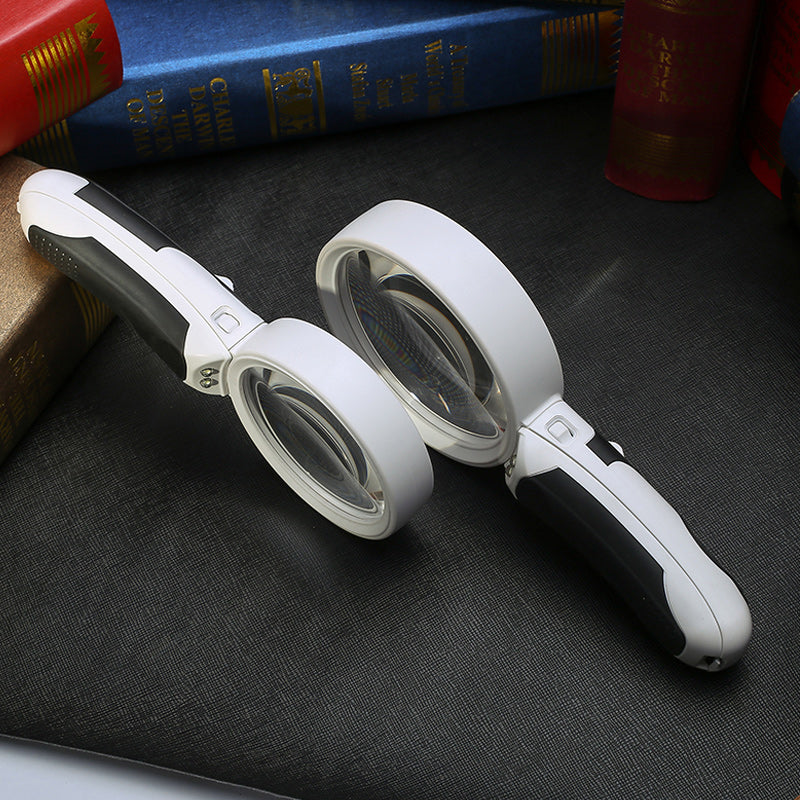 Portable 20X LED magnifying glass with bright light, a versatile vision aid for reading, hobbies & crafts.