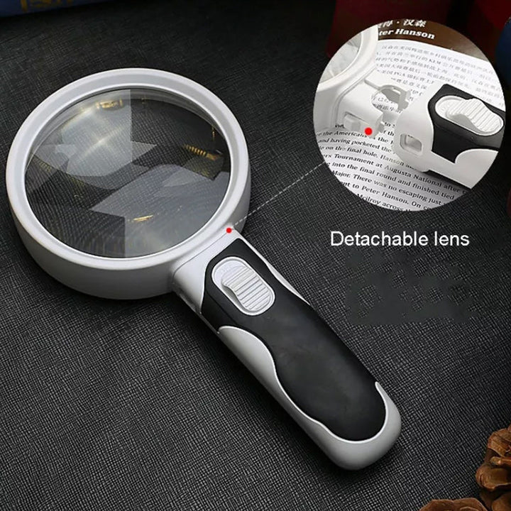 User holding the 20X LED handheld magnifier, demonstrating its comfortable grip for extended reading sessions.