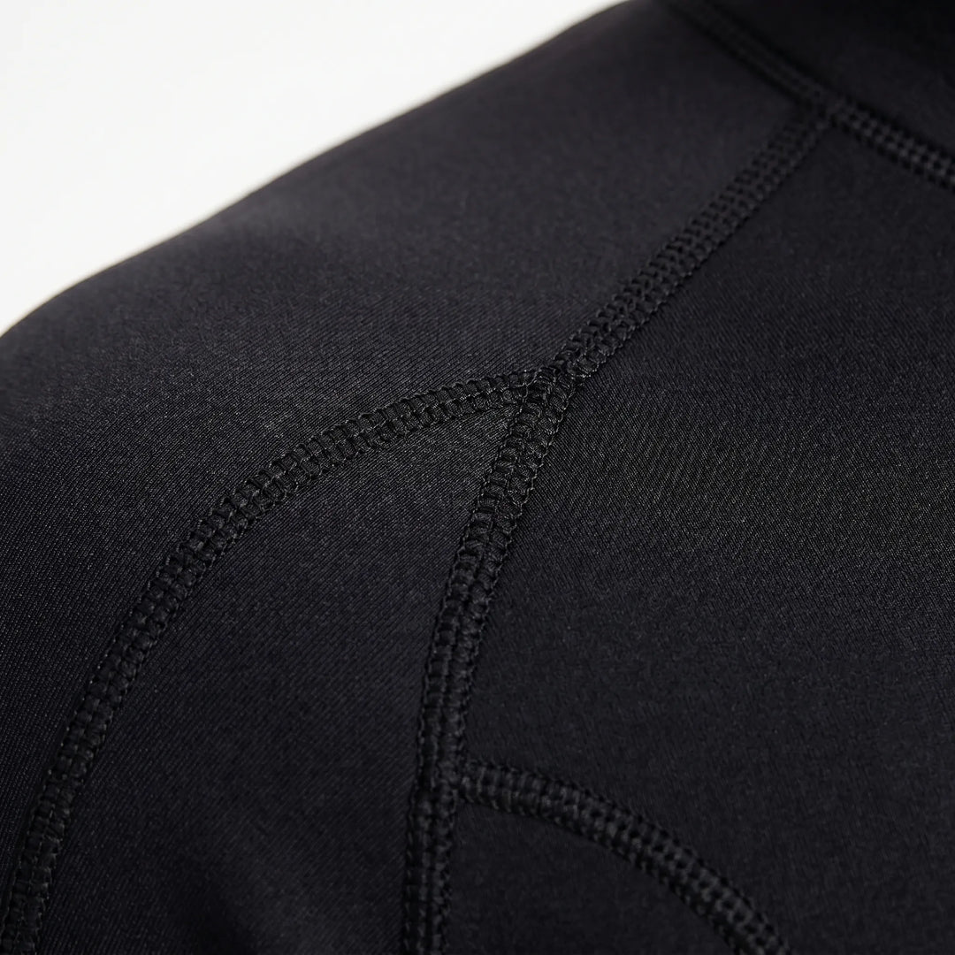 Lightweight 3mm shorty wetsuit offers warmth & flexibility for aquatic sports, including surfing gear.
