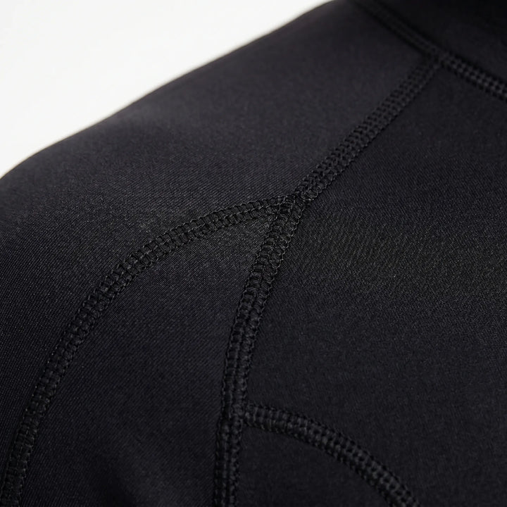 Lightweight 3mm shorty wetsuit offers warmth & flexibility for aquatic sports, including surfing gear.