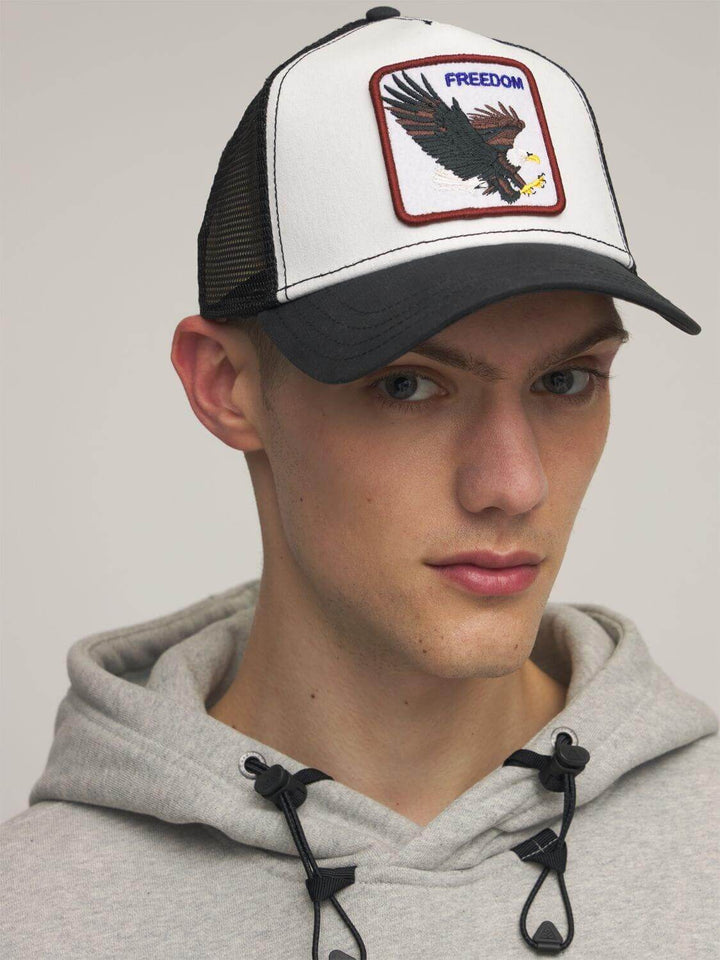 Versatile unisex adjustable cap, featuring a freedom eagle. Suitable for sun protection, active wear & casual style.