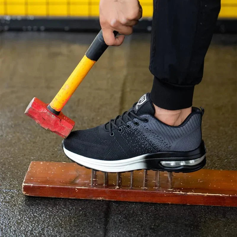 Lightweight & durable steel toe safety sneakers with air cushion sole. Unisex protective footwear for demanding jobs.