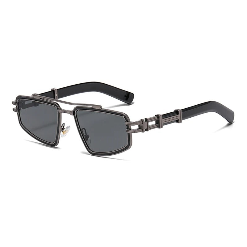 Pair of bold geometric metal frame sunglasses on a display, ready for stylish wear and UV protection