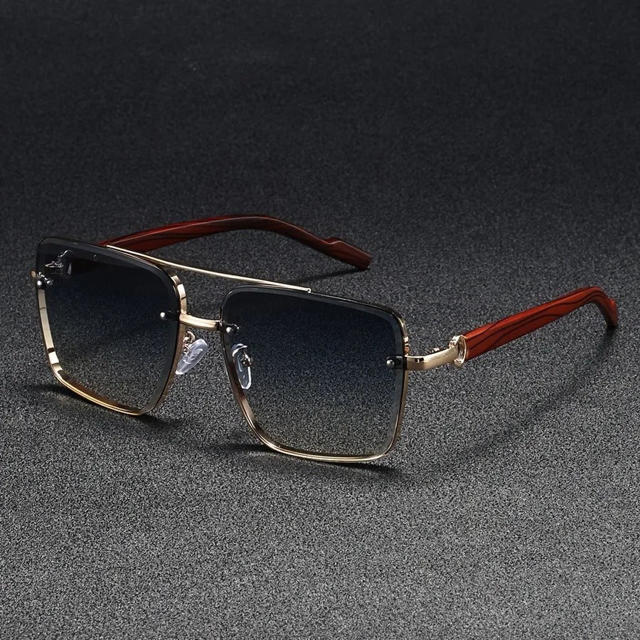 Bold square unisex sunglasses with gold frame & wooden arms, a fashionable eyewear accessory.