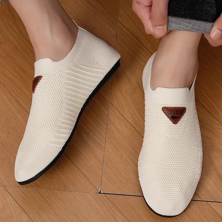 Close-up of the stretch knit upper on a breathable unisex comfort sneaker.