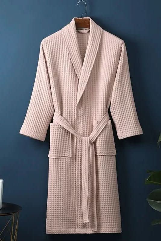 Soft unisex waffle knit bathrobe, breathable comfort for spa or shower, ideal lounge wear.