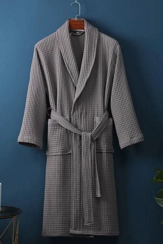 Unisex waffle bathrobe for ultimate loungewear comfort. Breathable design for relaxing at home.
