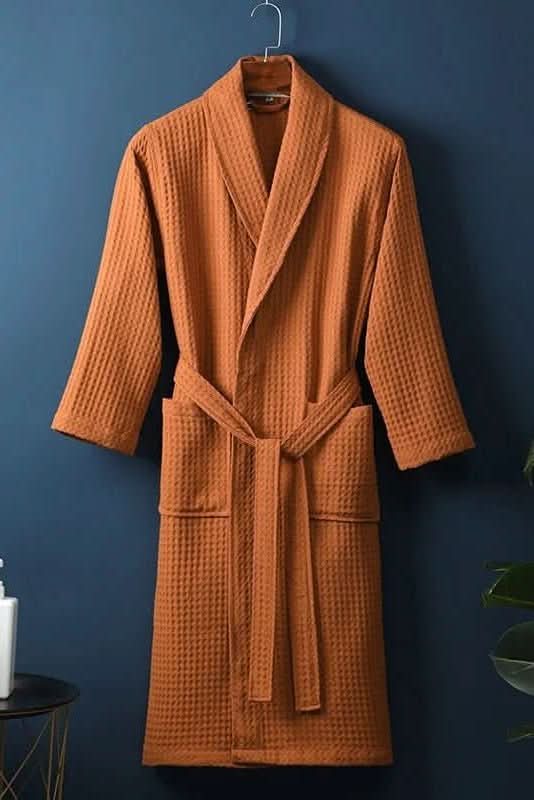 Breathable unisex waffle shower robe, ideal for post-spa relaxation & ultimate home comfort.