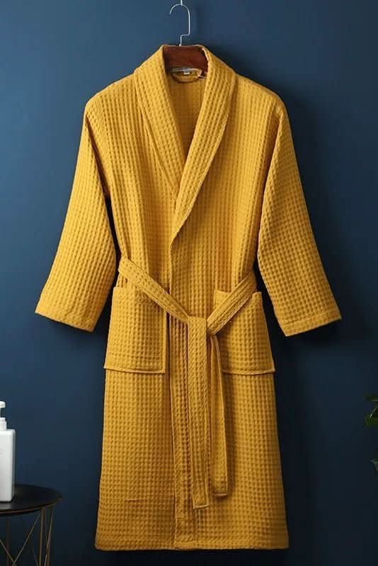 Soft breathable waffle fabric robe. Unisex design provides ultimate comfort as home or spa wear.