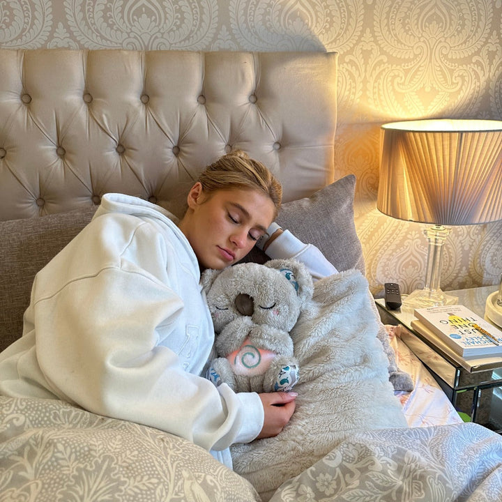 Unisex Calming Koala breathing plush toy, a soft comfort toy for relaxation, sleep aid & anxiety relief.