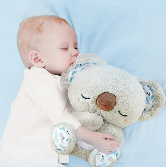 Soft Koala breathing plush with soothing night light, ideal sleep aid for kids & adults. Relieves anxiety.