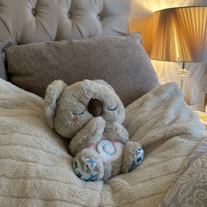 Gentle Koala plush toy, a relaxation and sleep aid for all ages. Helps relieve anxiety and promotes calm.