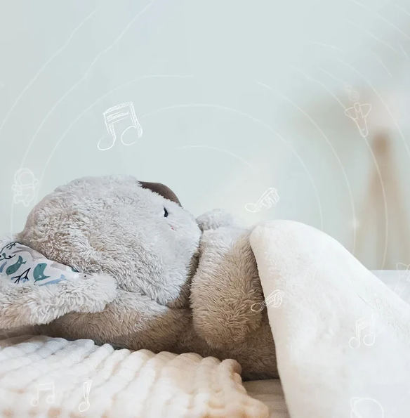 Soothing Koala plush toy with rhythmic breathing, a night light & sleep aid for a restful night. Calming comfort.