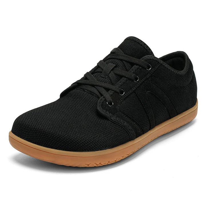 Minimalist barefoot shoes with wide toe box & flexible sole for healthy feet.