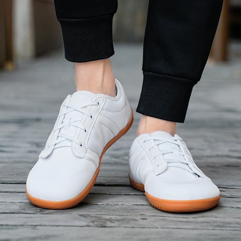 Experience natural movement with these minimalist barefoot shoes & flexible sole.
