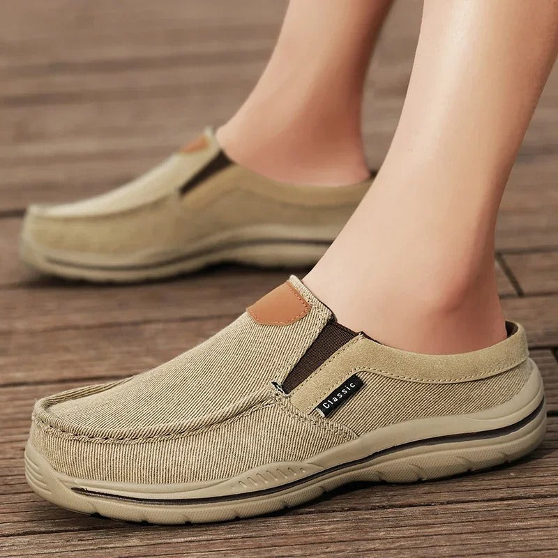 Stylish canvas slip-on footwear, unisex design for a relaxed, casual look.