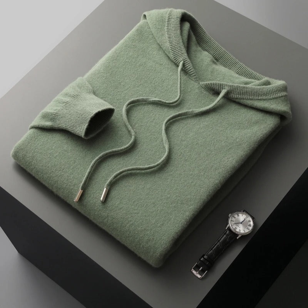 Unisex Classic Comfort Pullover Hoodie, on a hanger, showcasing drape of fabric