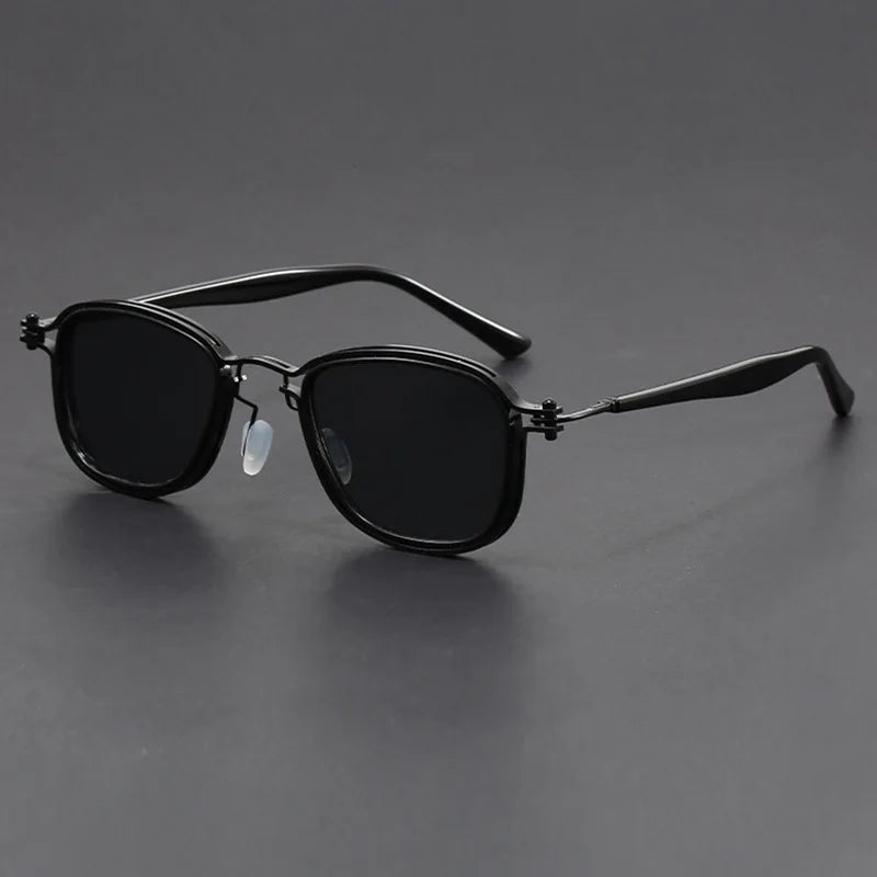 Close-up of black unisex square frame sunglasses, essential summer eyewear accessory