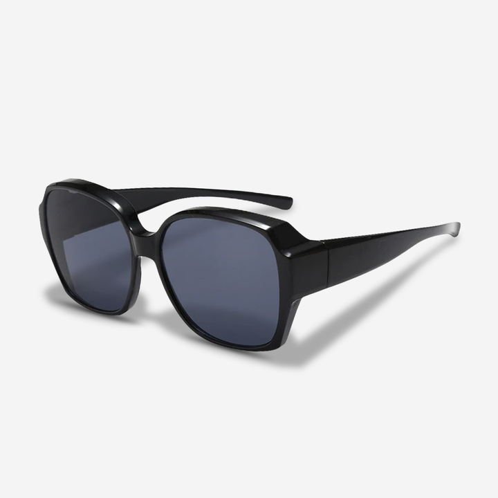 Black clip-on sunglasses, perfect for prescription eyewear, ensuring full UV400 protection and comfort.