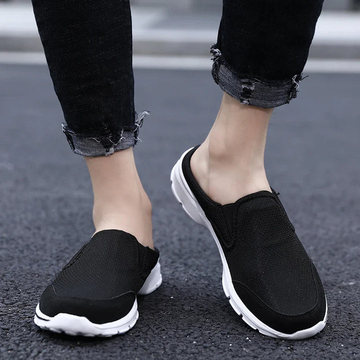 Pair of unisex laceless comfort shoes, showcasing their lightweight and flexible construction.