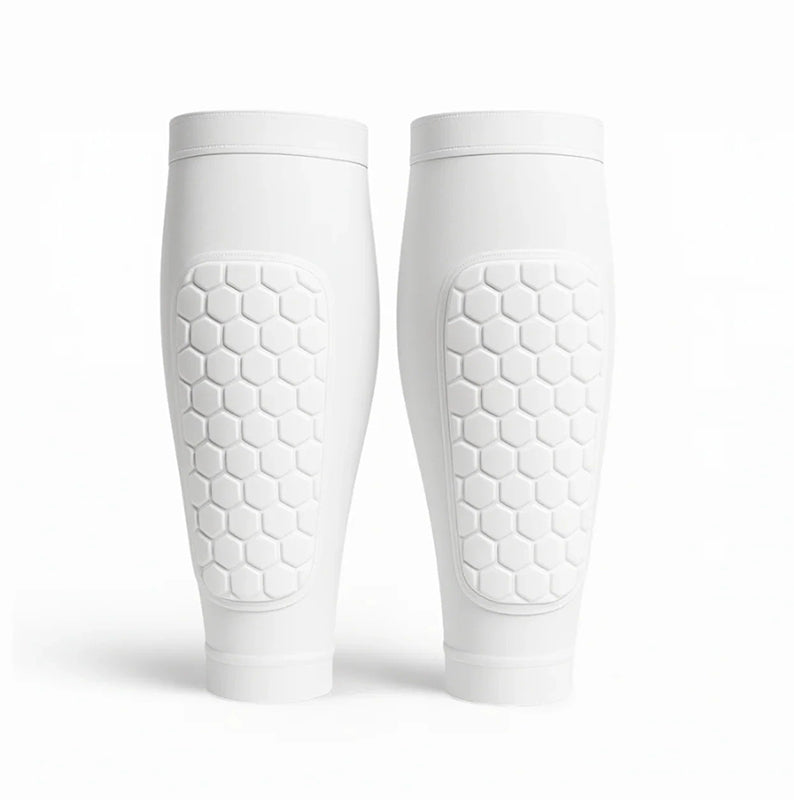 Comfortable unisex shin guards for comprehensive leg protection during sports, skiing, & athletic activities.