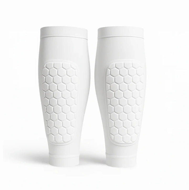 Comfortable unisex shin guards for comprehensive leg protection during sports, skiing, & athletic activities.
