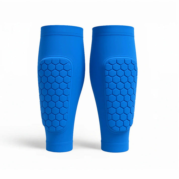 Athletic unisex shin guards designed for comfort & superior leg protection in skiing, soccer, & sports.