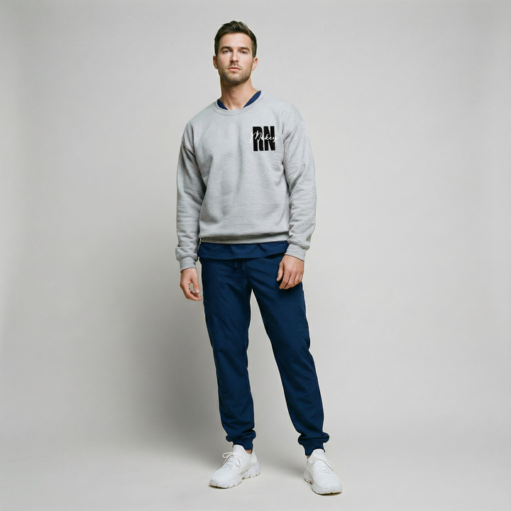 Person wearing a customizable unisex crewneck sweatshirt, full body shot, casual wear, outdoor setting
