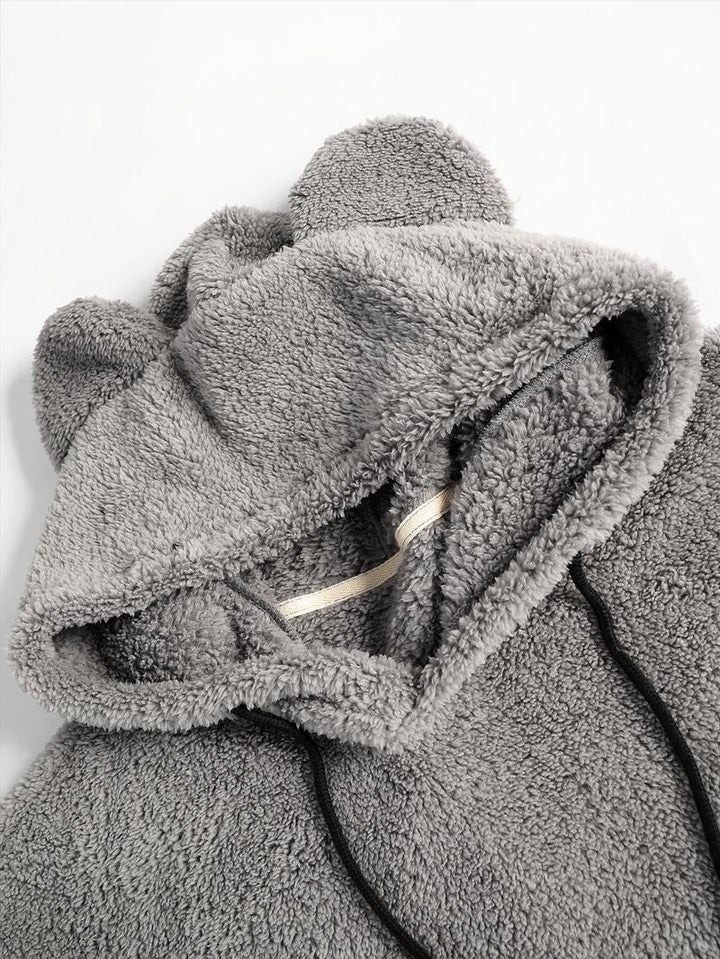 Cozy teddy fleece hoodie with playful bear ears, a soft oversized fit for casual days