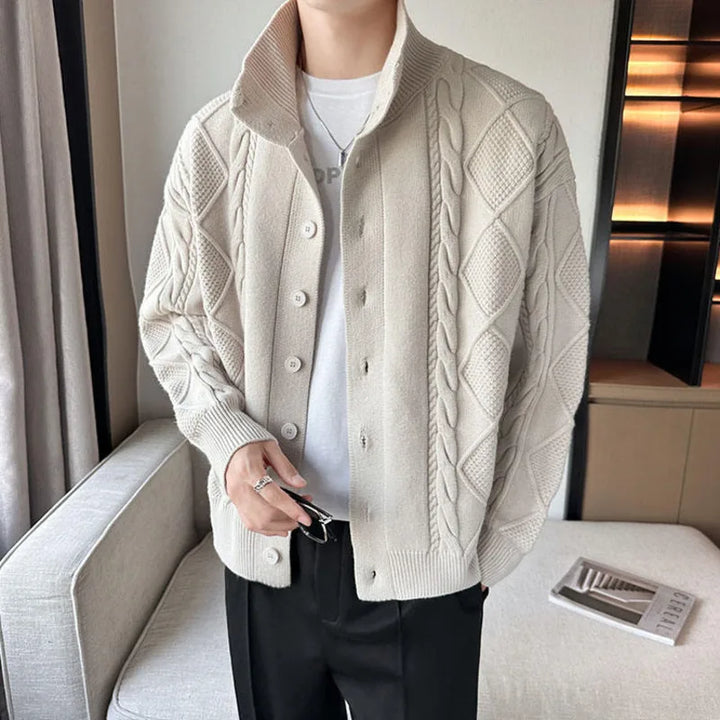 Folded unisex wool knit cardigan sweater, emphasizing its soft knit, ready for cozy wear and winter fashion.
