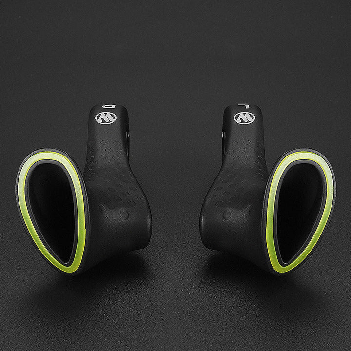 Pair of ergonomic bicycle grips designed for superior cycling comfort, reducing hand pain & fatigue.