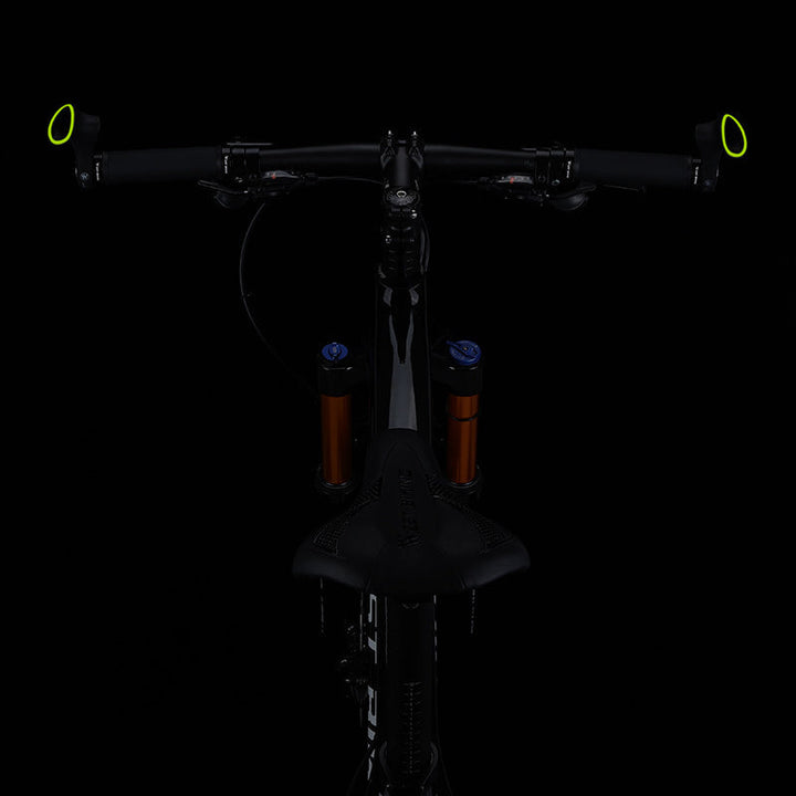 Road bike ergonomic grips, engineered for cycling comfort and pain relief on long-distance rides.