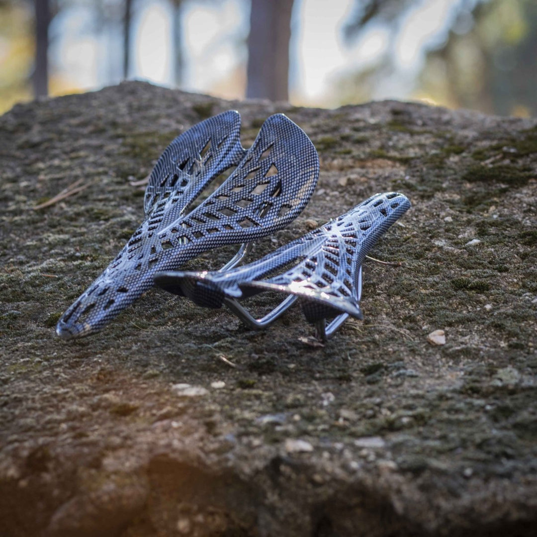 Comfortable ergonomic bicycle seat with pressure relief design, ideal for long-distance cycling.