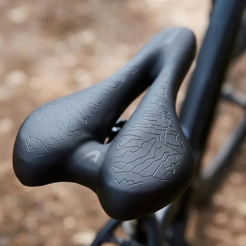 Unisex ergonomic bike saddle with memory foam for ultimate cycling comfort and support.