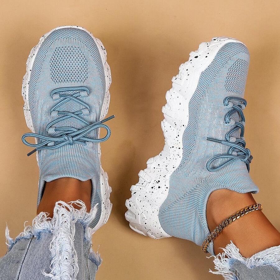 Unisex Everyday Comfort Low-Top Sneakers, two pairs in different colors, highlighting their versatile style