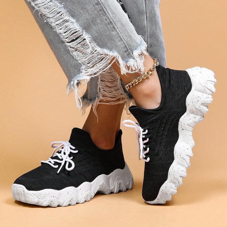 Unisex Everyday Comfort Low-Top Sneakers with contrasting laces, highlighting personalization options