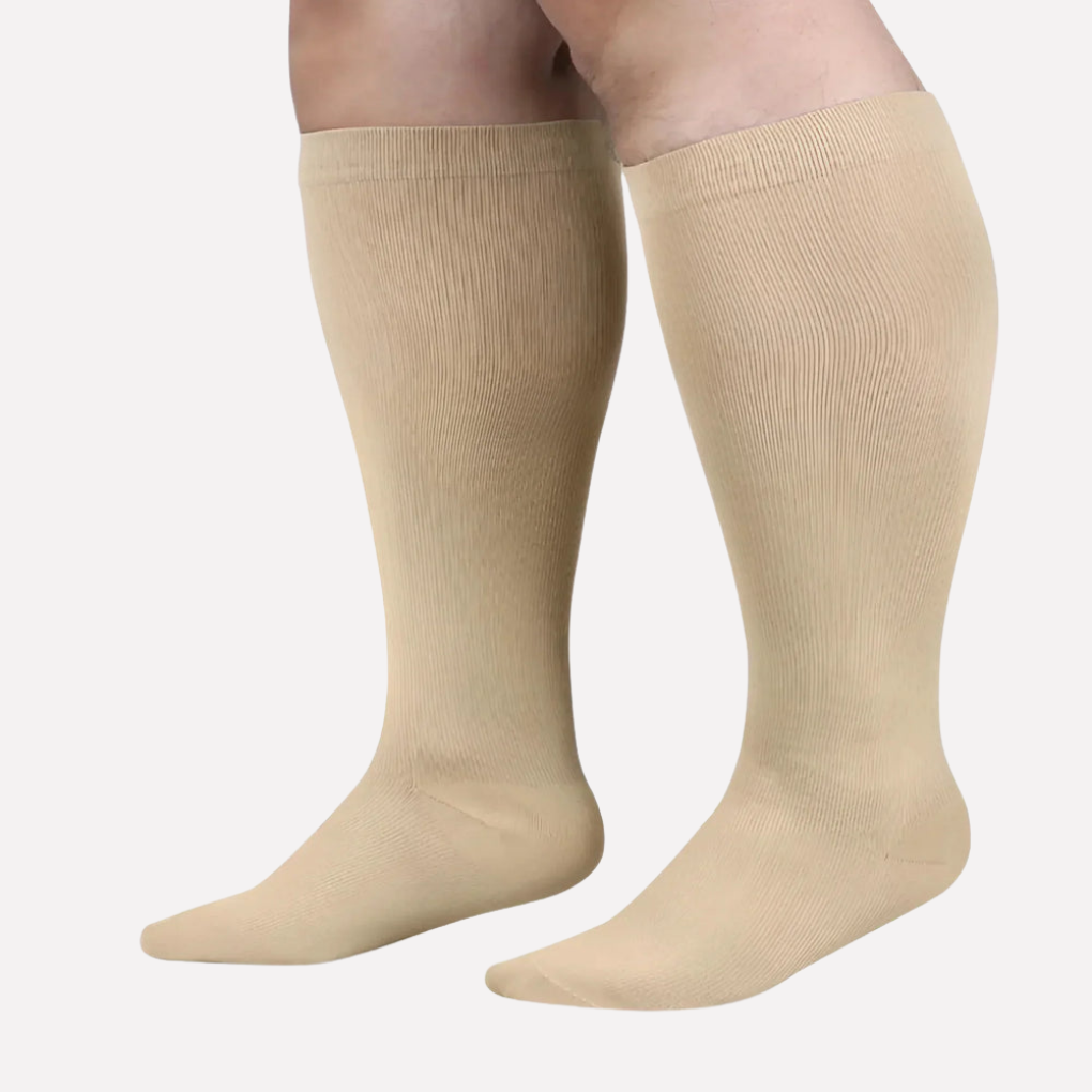 Supportive unisex compression socks for enhanced circulation, daily wear, travel, & work. Graduated leg pressure.