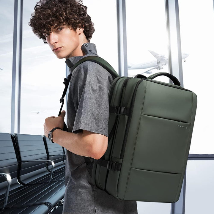 Laptop-friendly expandable backpack (26-45L), waterproof for all travel needs.