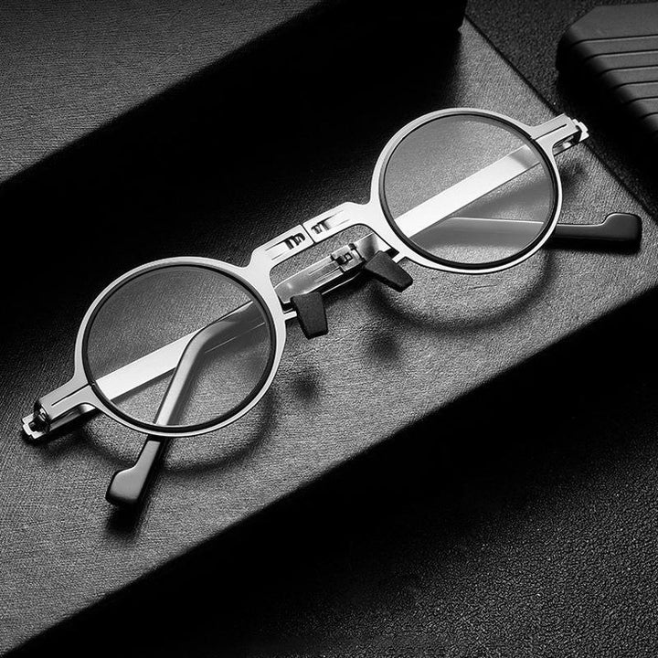 Portable magnifying foldable reading glasses with blue light filter. Unisex design for travel & digital screen protection.