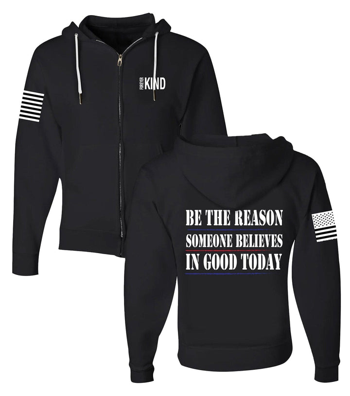 Unisex oversized hoodie, 'Adventure Awaits' graphic. Black color, warm fleece apparel.