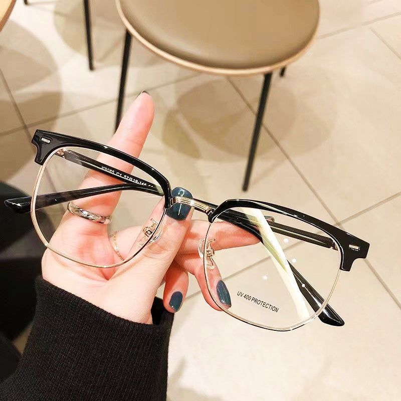Close-up of stylish unisex half-rim blue light blocking glasses, ideal for computer use.