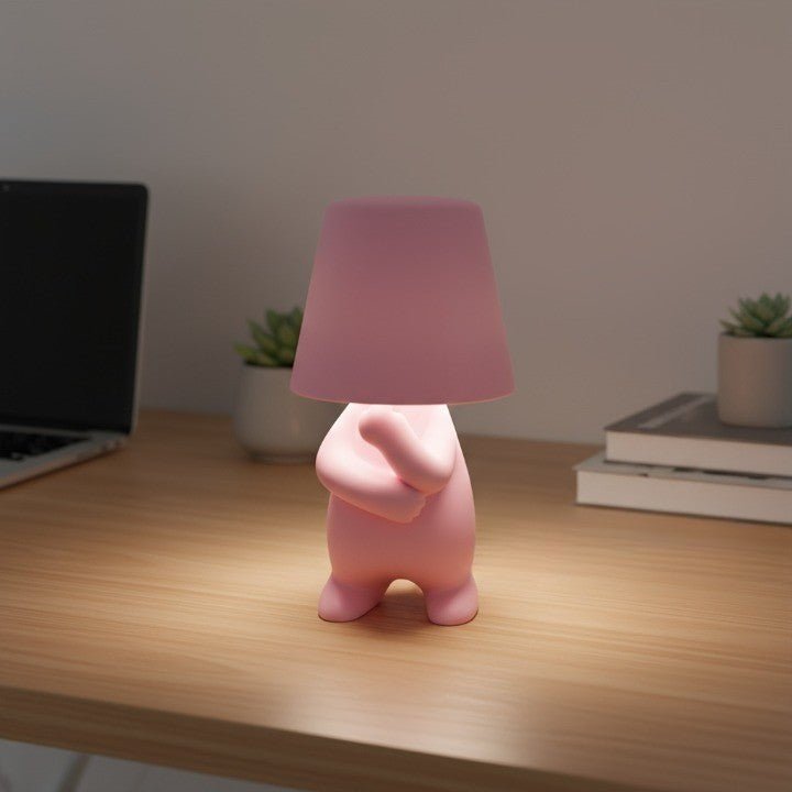 Rechargeable human figure LED table lamp, perfect as a modern desk light or creative accent for any room.