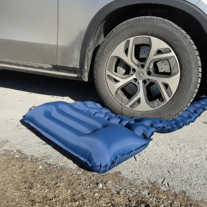 Compact inflatable sleeping pad for hikers, offering comfort & support on any terrain.