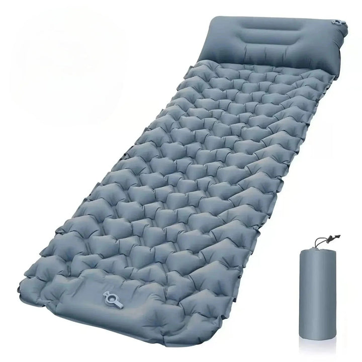 Durable inflatable sleeping pad, essential lightweight gear for backpacking trips.
