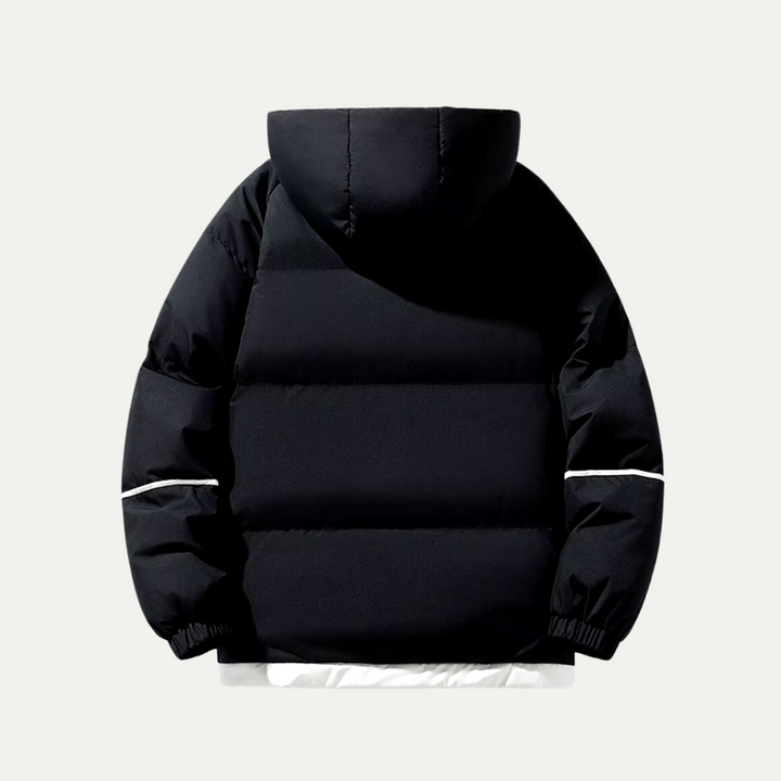 Full-length view of a person wearing a unisex hooded puffer parka, ready for cold adventures.